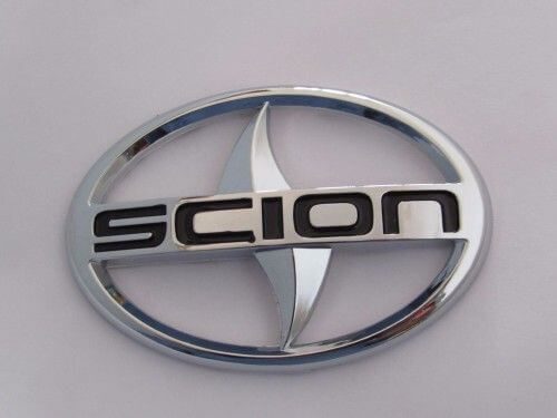 Emblem Logo Toyota Scion Warna Chrome Hitam Ukuran 9x6.2cm