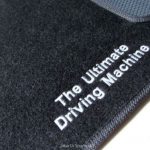 Karpet BMW Seri 3 F30 Bahan Beludru Super Warna Hitam Logo The Ultimate Driving Machine - 2 Baris